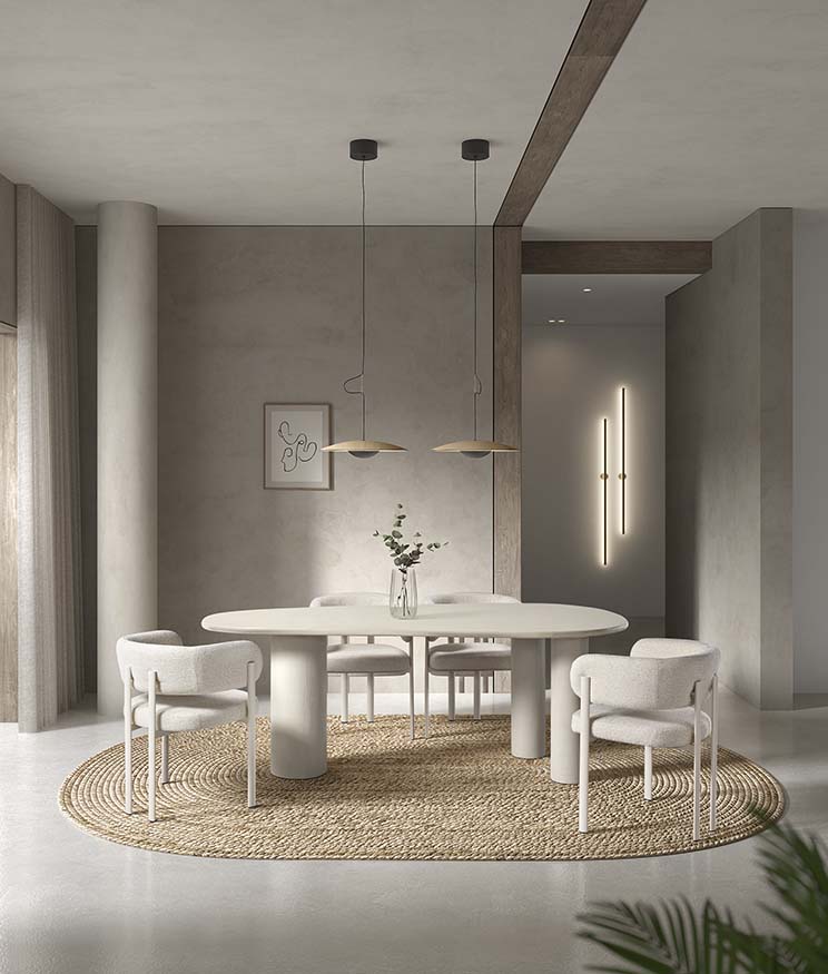 Mesa de comedor rectangular con superficie porcelánica blanca veteada y base escultórica de madera clara, perfecta para espacios de diseño moderno y luminoso. Boutique Interiorismo.