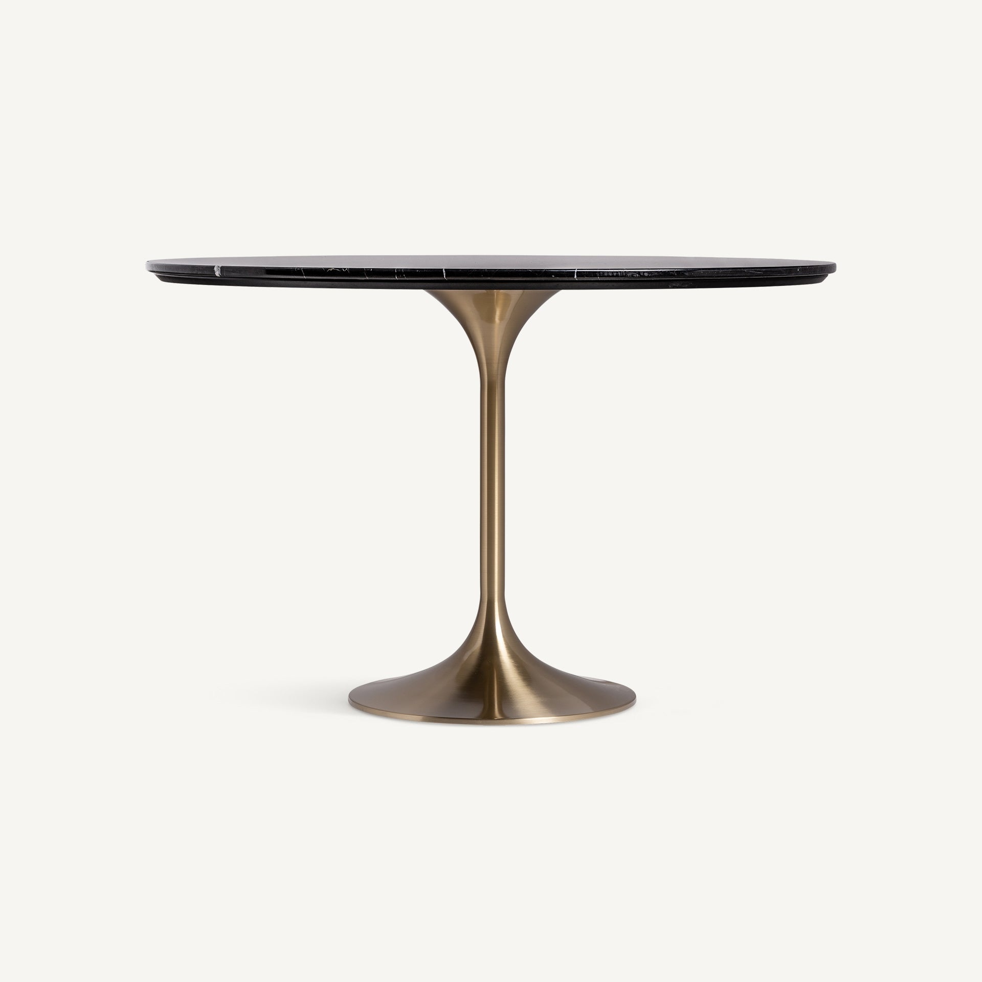 mesa redonda pedestal mármol negro y base dorada estilo art déco boutique_interiorismo-vical