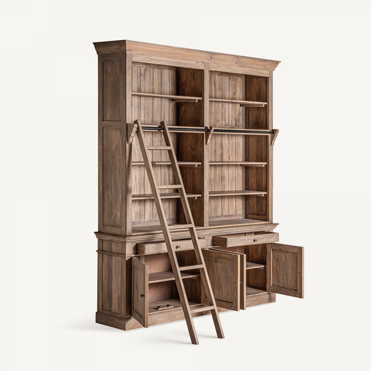 Librería Mandern con puertas y cajones abiertos, madera sólida y detalles funcionales, con escalera de acceso, boutique interiorismo VICAL.