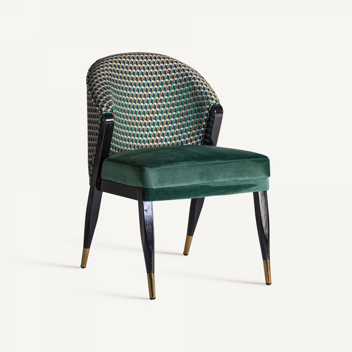 Silla sillón tapizada en terciopelo verde con patas negras, estilo elegante y contemporáneo