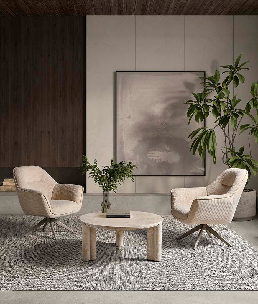 Mesa auxiliar redonda de madera natural con tapa lisa y base geométrica original, diseño escandinavo contemporáneo ideal para salones luminosos y espacios funcionales. Boutique Interiorismo.