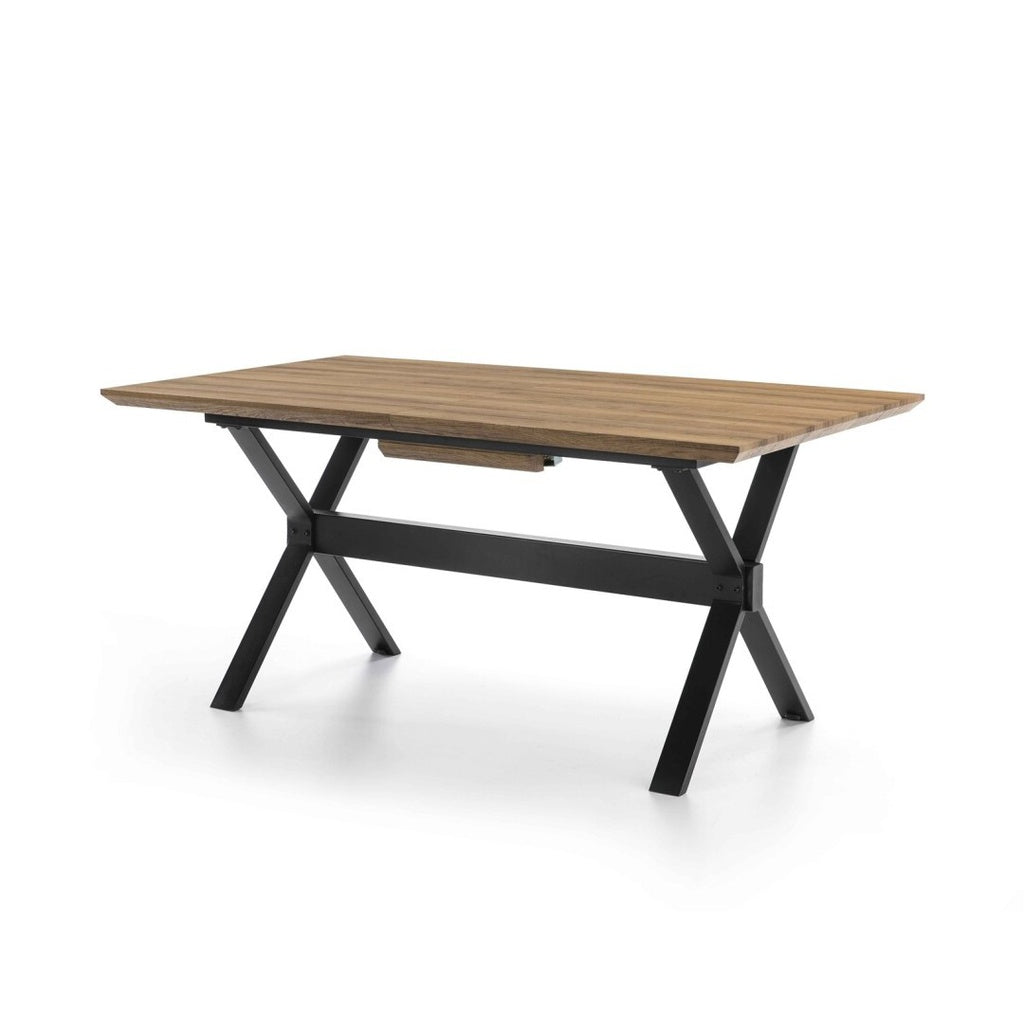Mesa comedor rectangular extensible en madera natural con base de acero negro — diseño contemporáneo para espacios sofisticados de Boutique Interiorismo.