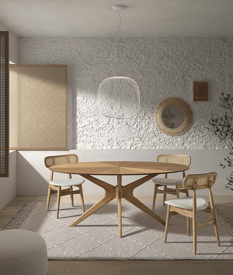 Mesa de comedor redonda de roble natural con diseño escandinavo, líneas limpias y base central, perfecta para comedores luminosos y acogedores. Boutique Interiorismo.