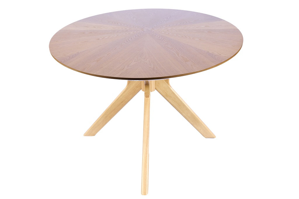 Mesa de comedor redonda de roble natural con diseño escandinavo, líneas limpias y base central, perfecta para comedores luminosos y acogedores. Boutique Interiorismo.