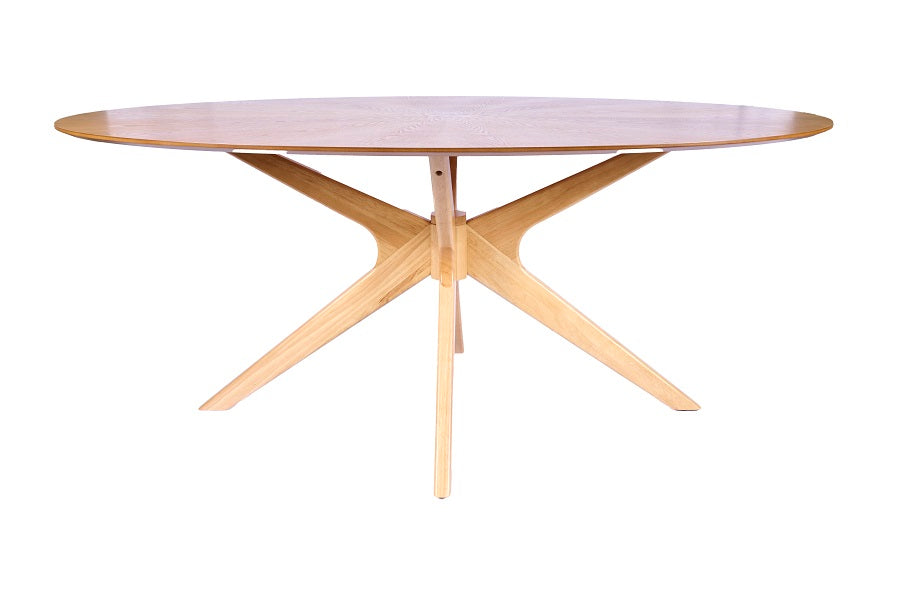 Mesa de comedor redonda de roble natural con diseño escandinavo, líneas limpias y base central, perfecta para comedores luminosos y acogedores. Boutique Interiorismo.