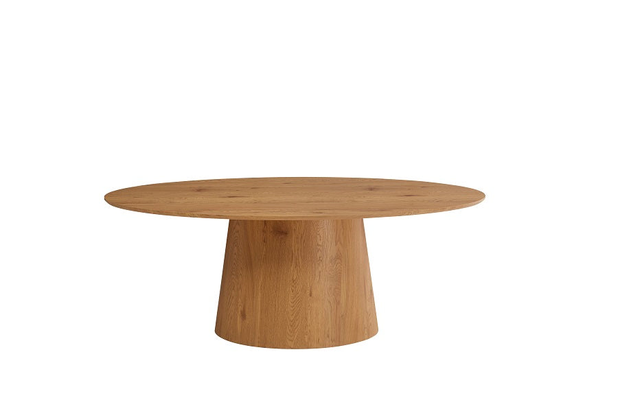 Mesa de comedor ovalada en madera natural con base central curva — diseño suave y escultural de Boutique Interiorismo.