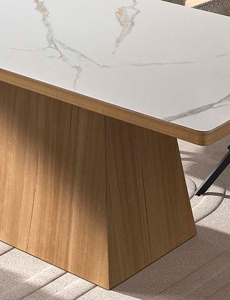 Mesa comedor rectangular con base acanalada en madera de veta natural — estilo cálido y contemporáneo de Boutique Interiorismo.

