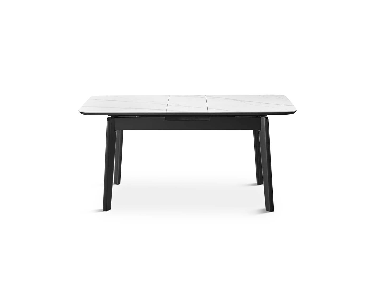 Mesa rectangular negra con estructura metálica — propuesta elegante de corte industrial de Boutique Interiorismo.