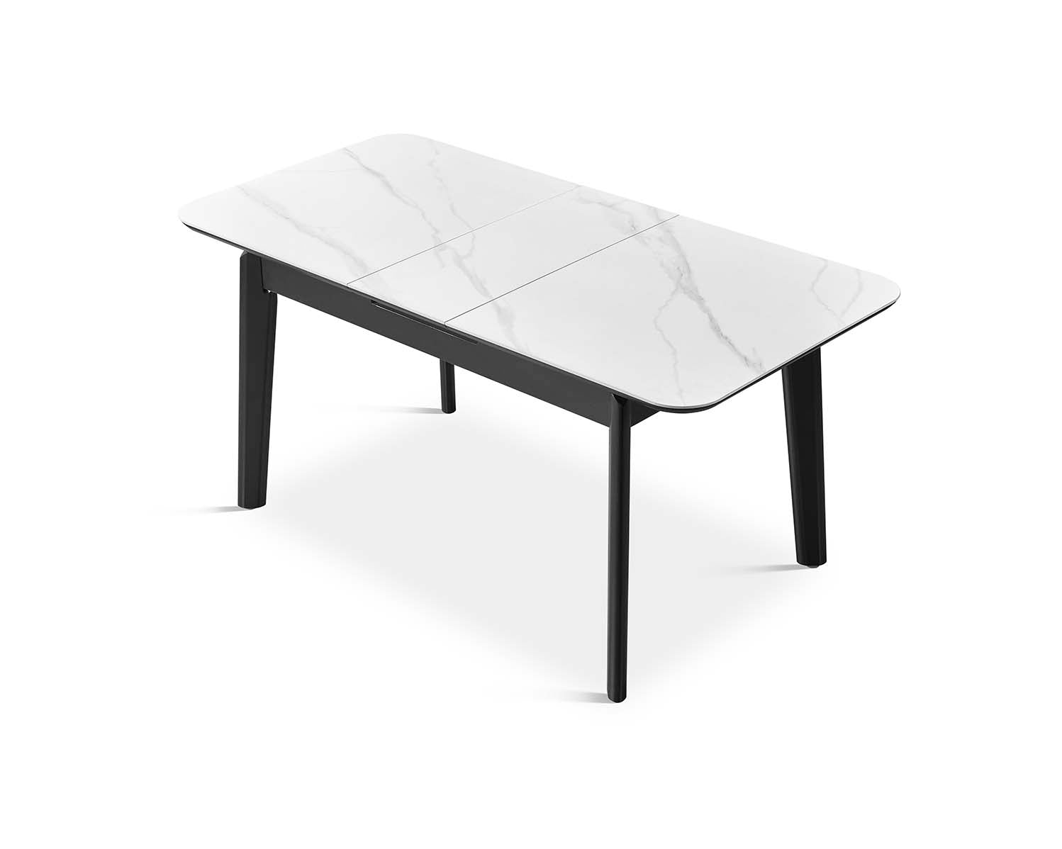 Mesa comedor rectangular extensible con estructura metálica y sobre blanco — solución funcional y versátil de Boutique Interiorismo.