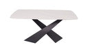 Detalle de base metálica cruzada en mesa comedor blanca de diseño moderno — estilo estructural y elegante de Boutique Interiorismo.