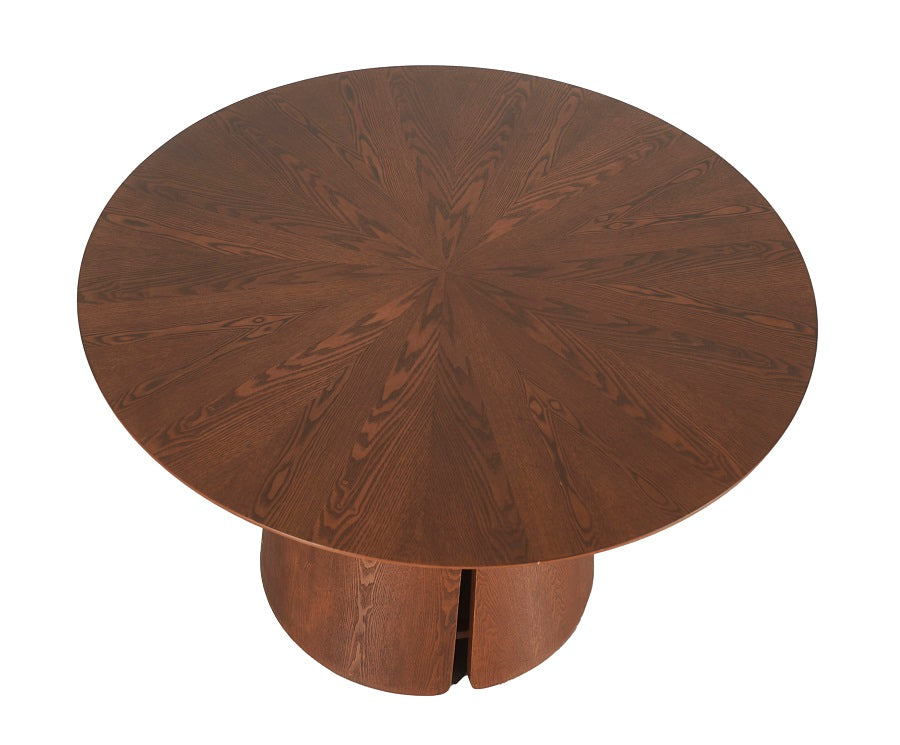 Vista superior de mesa comedor de nogal con formas geométricas — sofisticación natural y diseño de autor en Boutique Interiorismo.