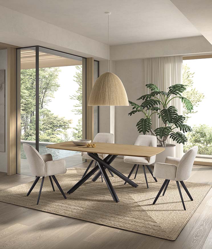 Mesa de comedor rectangular de madera natural con patas metálicas tubulares entrelazadas en color negro, diseño moderno y escultórico ideal para interiores con carácter. Boutique Interiorismo.
