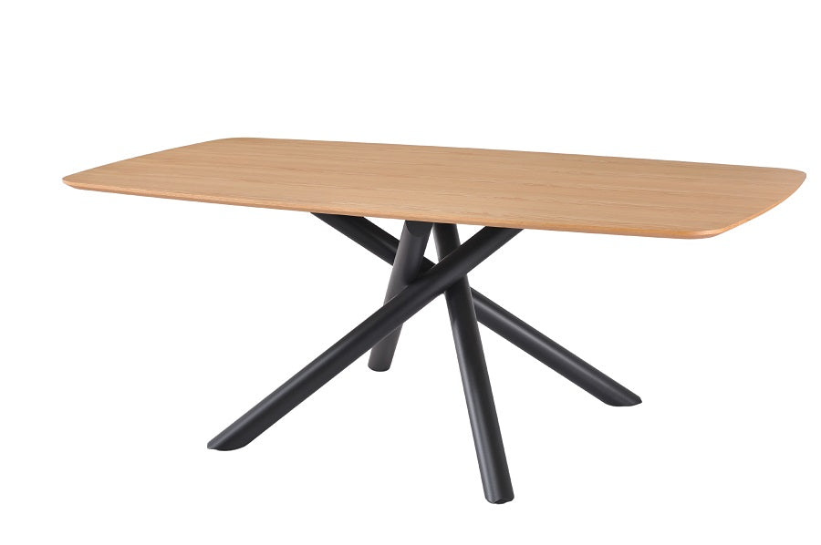 Mesa de comedor rectangular de madera natural con estructura metálica negra, estilo industrial moderno perfecto para ambientes urbanos y elegantes. Boutique Interiorismo.