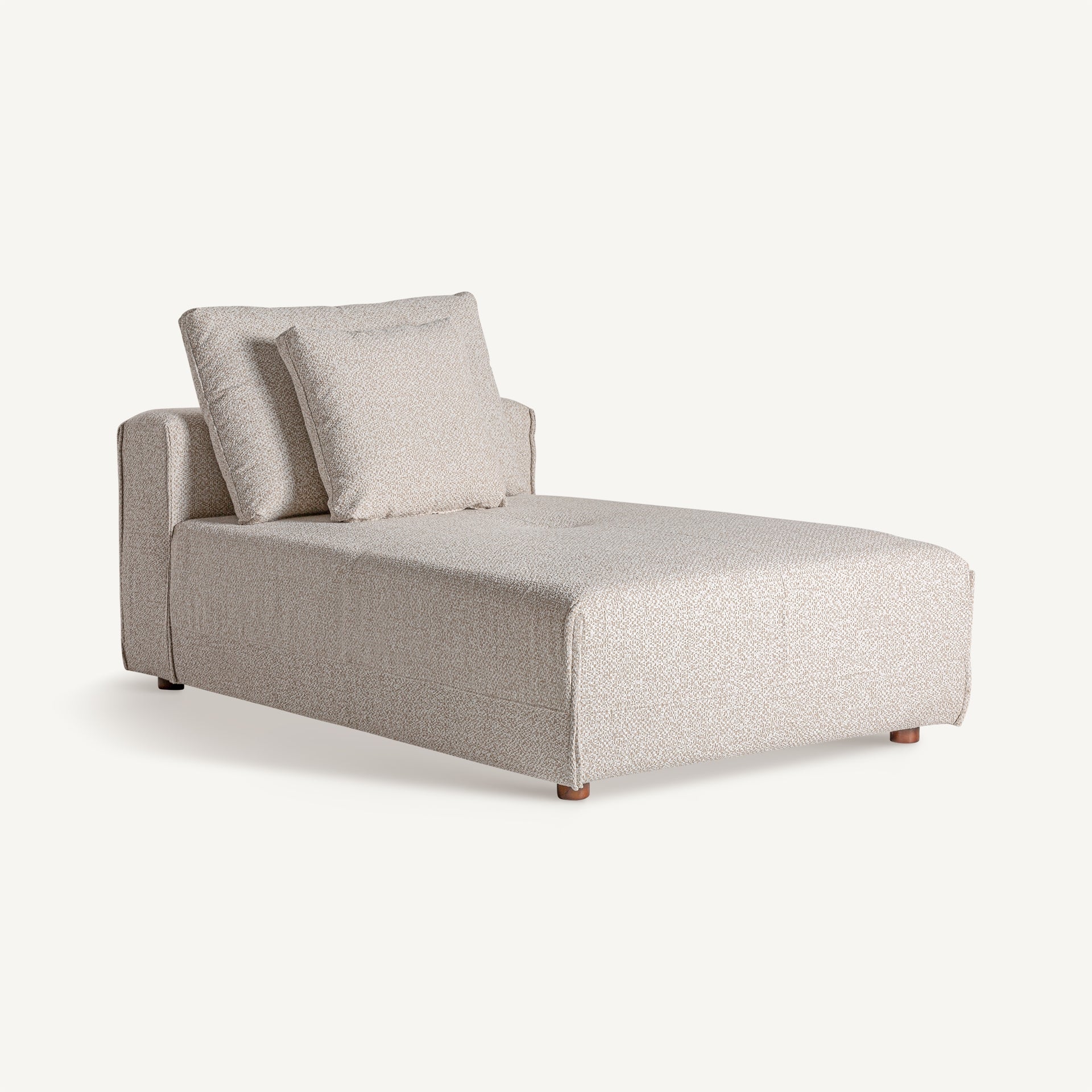 Vista lateral del sofá modular Vignaie en color crema, ideal para salones minimalistas