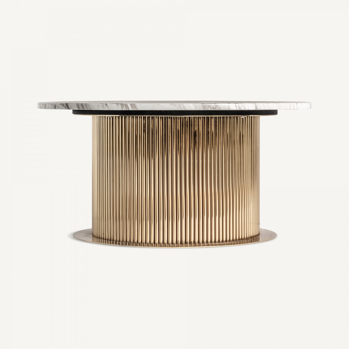 Mesa de centro redonda con base estriada dorada y sobre de mármol veteado – estilo art déco boutique interiorismo VICAL