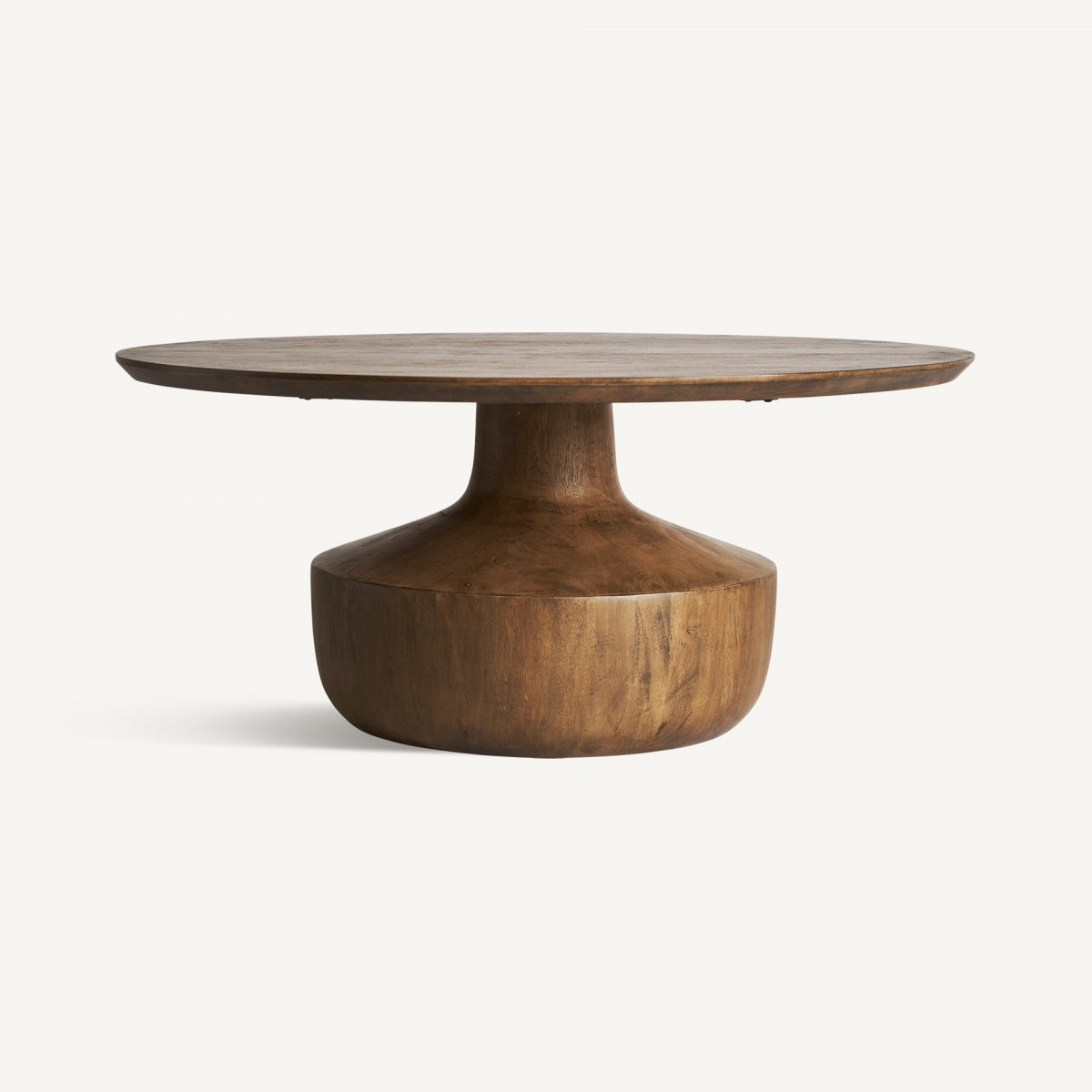 Mesa de centro redonda en madera de mango natural con base escultórica, estilo rústico contemporáneo.