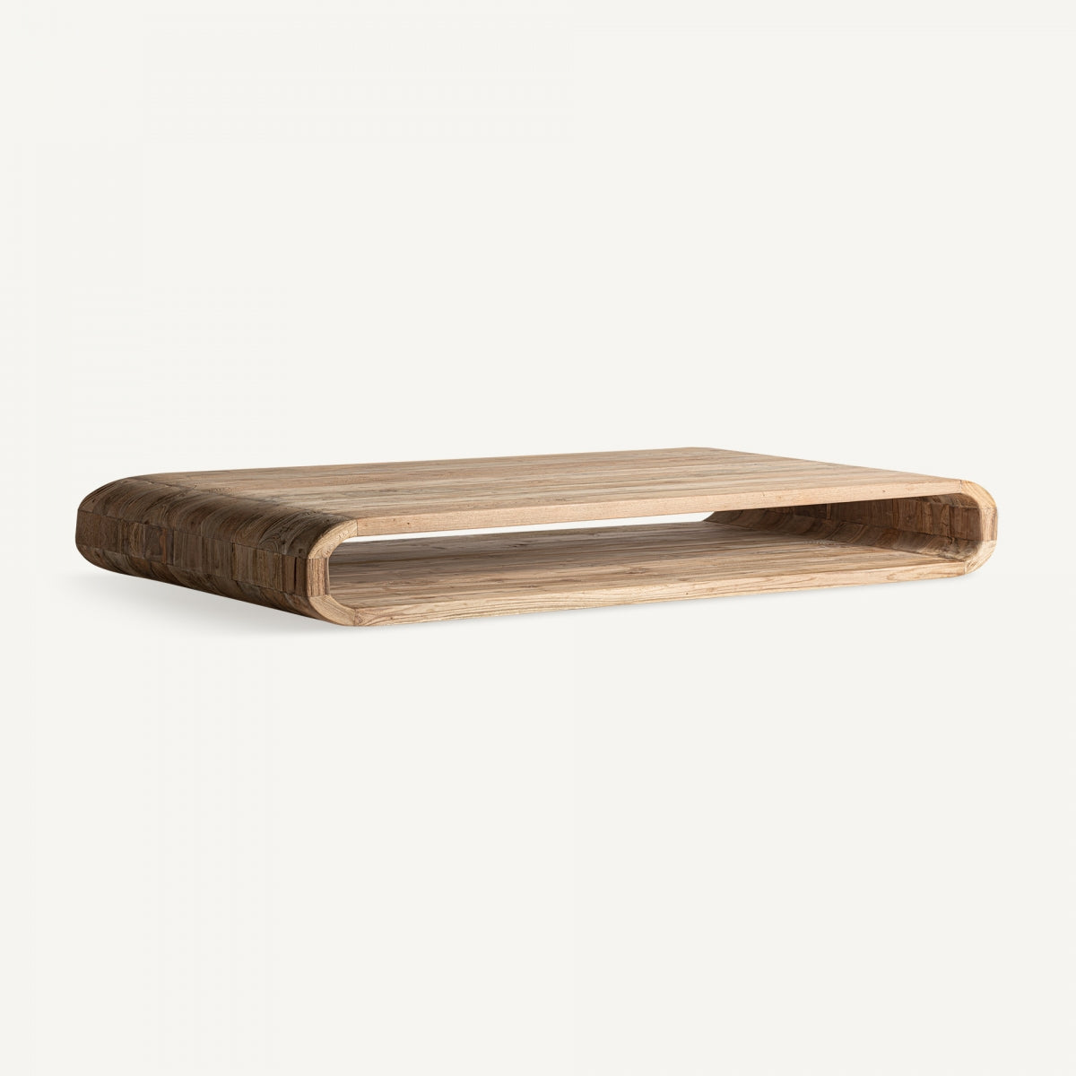 Vista lateral de la mesa de centro CORBA en madera natural con diseño curvo envolvente y forma rectangular
