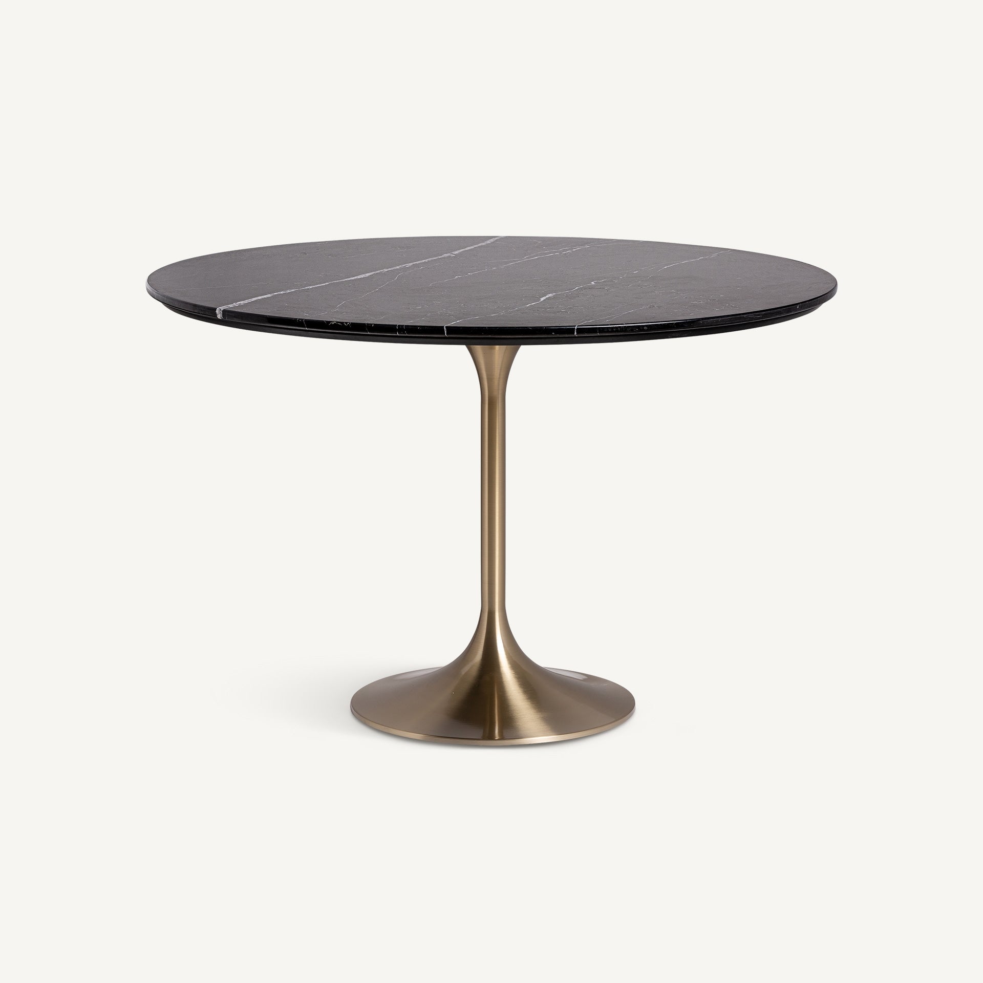 mesa comedor mármol negro con pata central metálica vista en ángulo boutique_interiorismo-vical