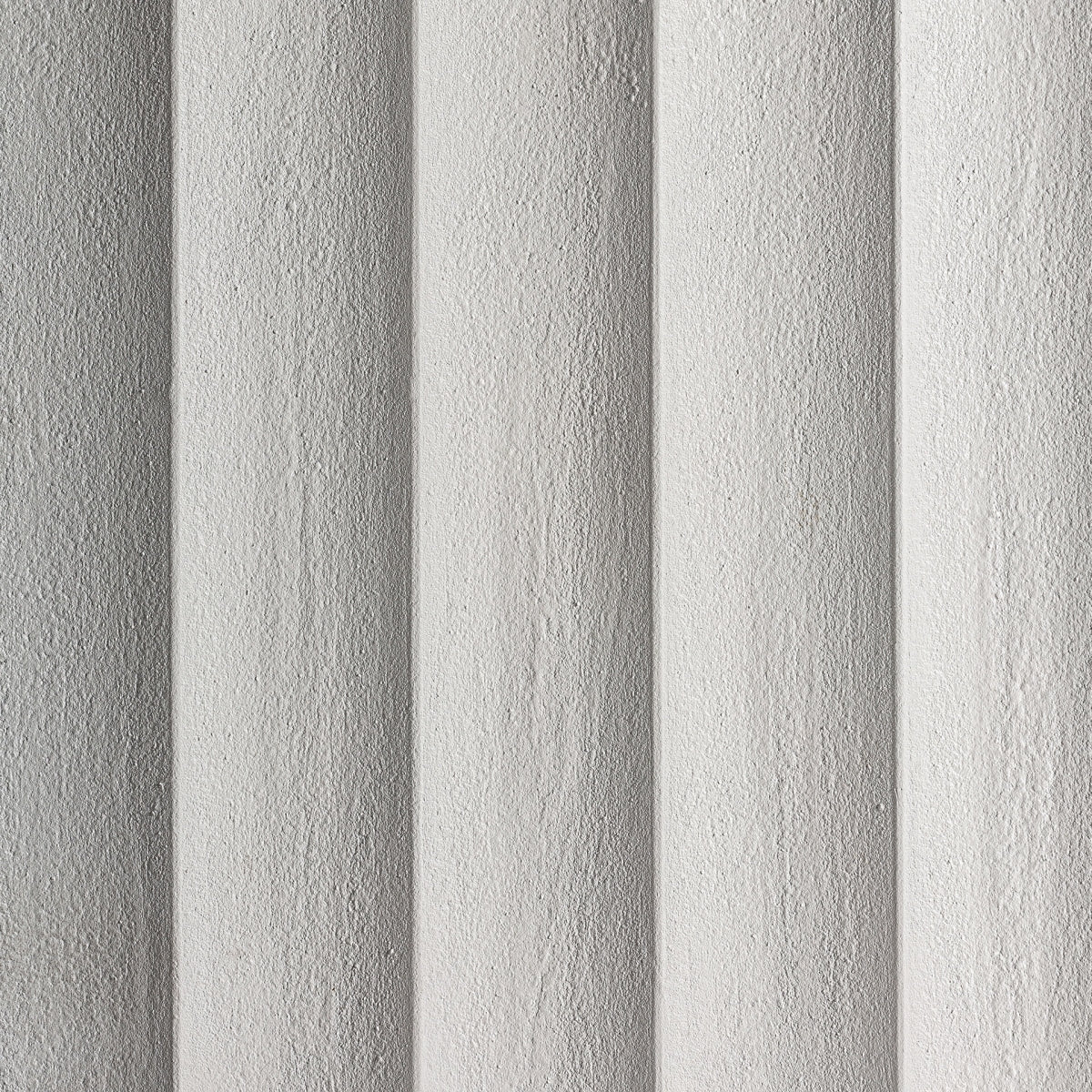 Primer plano del patrón acanalado en el aparador blanco, textura natural y estilo arquitectónico.