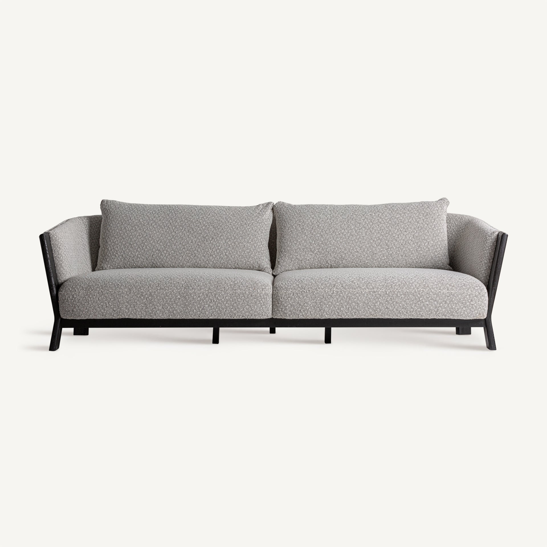 Sofá Nara frontal con tapizado gris y base de roble teñido en negro, estilo japandi moderno