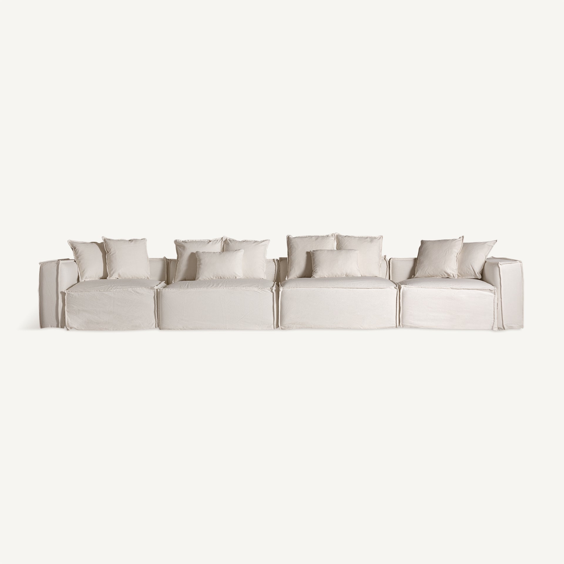 Vista frontal completa de composición con varios módulos Virolle, sofá modular blanco de lino boutique interiorismo vical