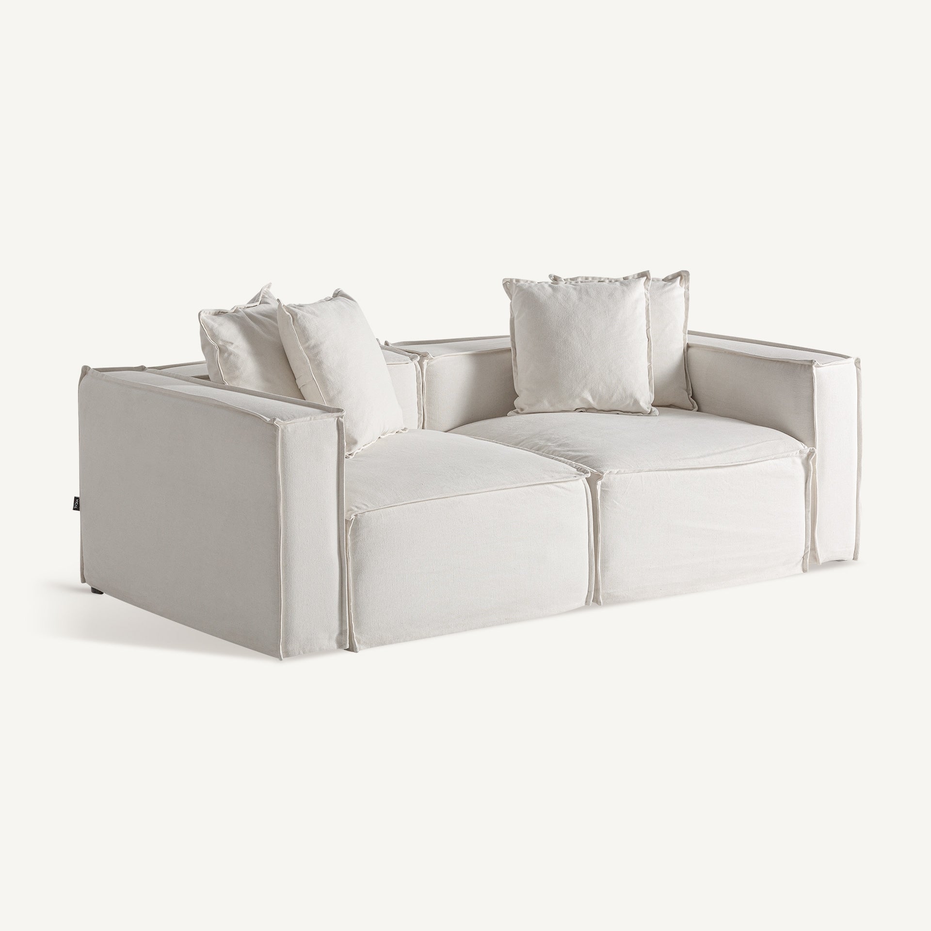 Composición en ángulo con módulos Virolle, sofá modular blanco de inspiración colonial boutique interiorismo vical