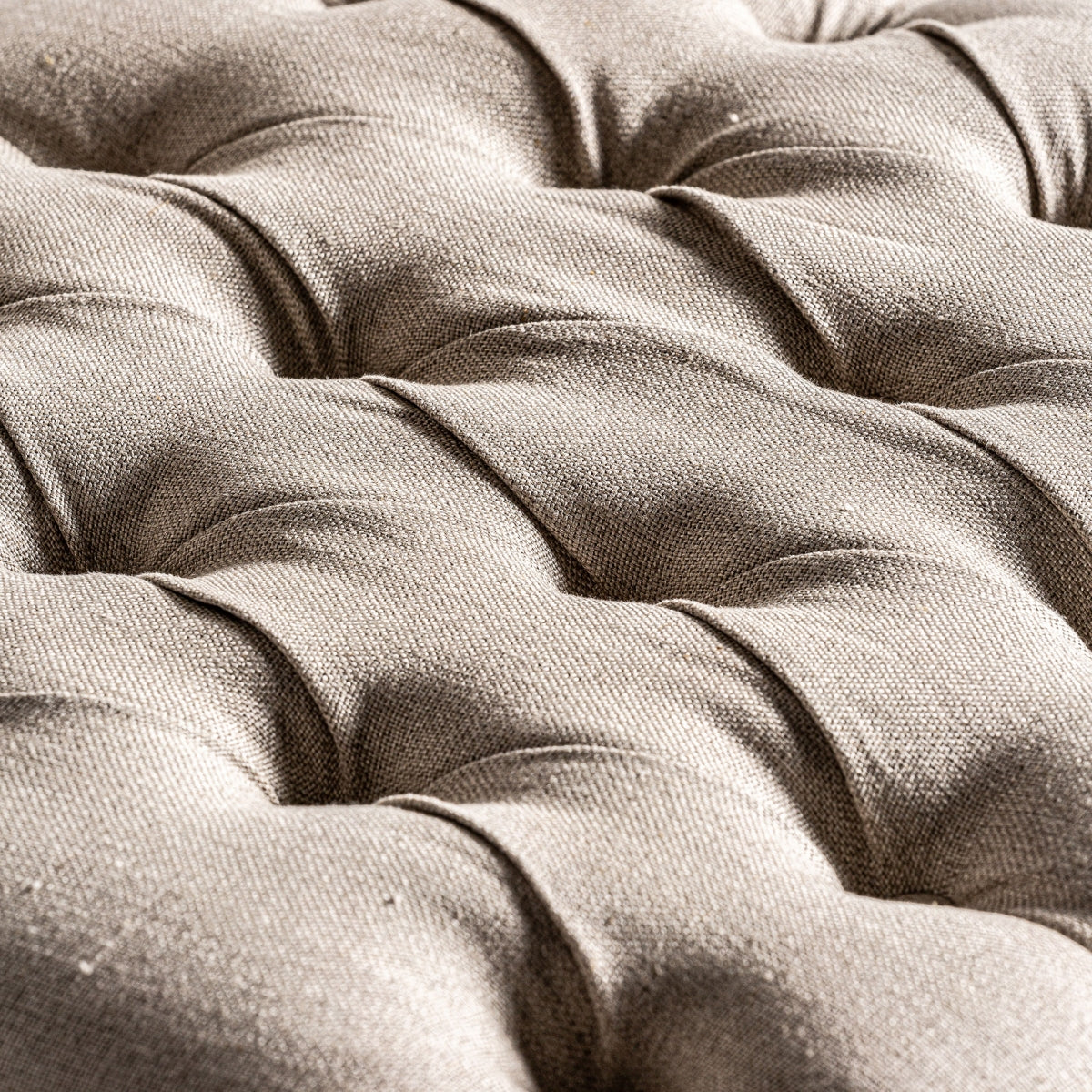 detalle textura asiento capitoné lino natural boutique_interiorismo vical