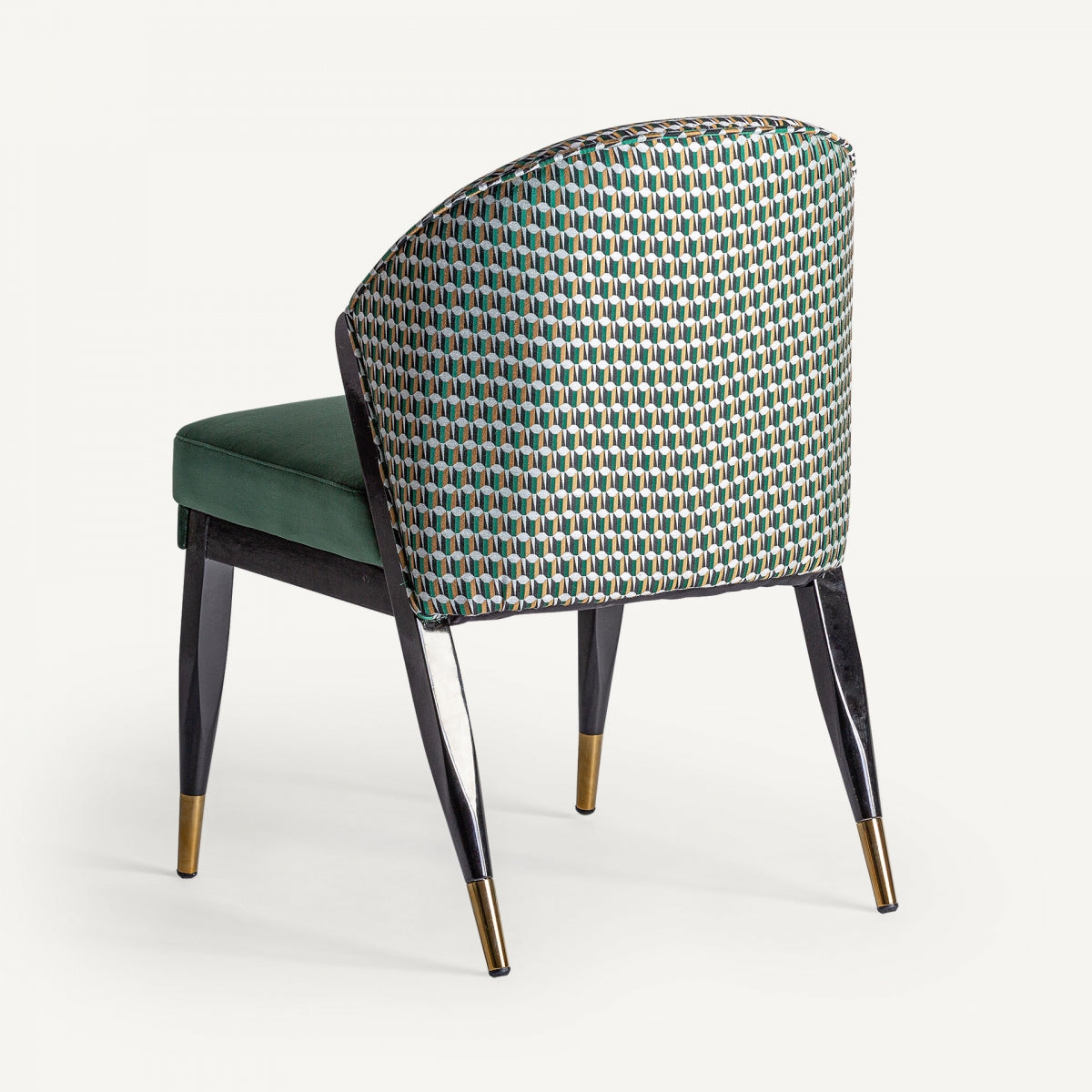 Vista trasera de la silla Kelheim en terciopelo verde con estructura negra, estilo sofisticado