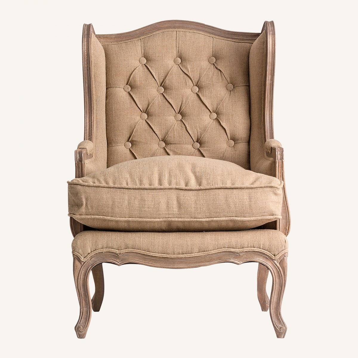 Sillón orejero clásico en lino beige con respaldo abotonado – vista frontal completa, boutique_interiorismo-vical