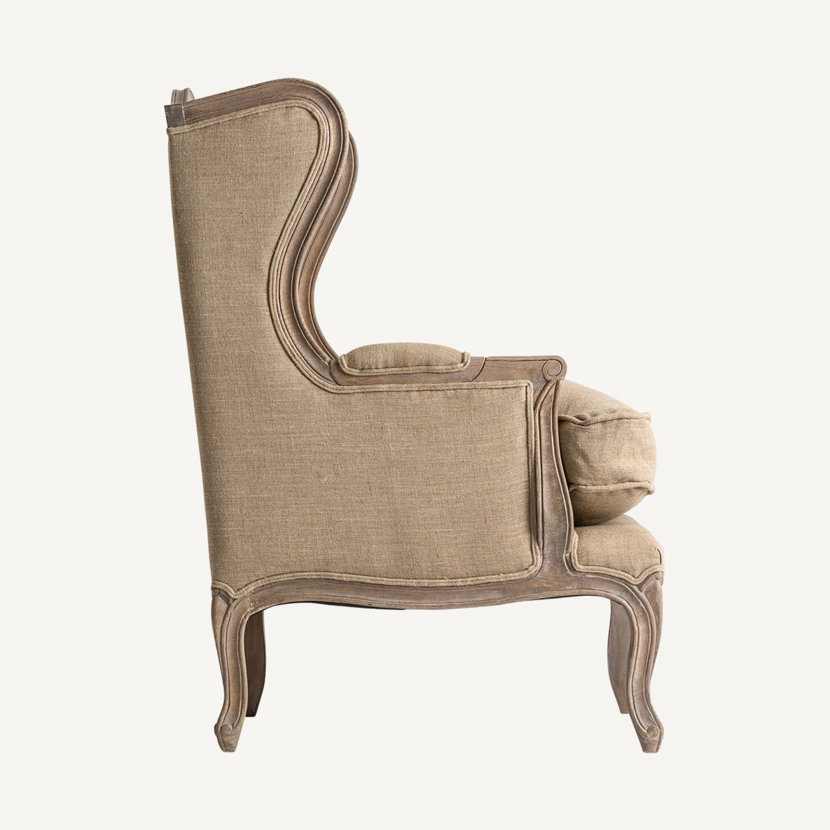 Sillón orejero en lino con patas curvas de estilo francés – vista lateral izquierda, boutique_interiorismo-vical