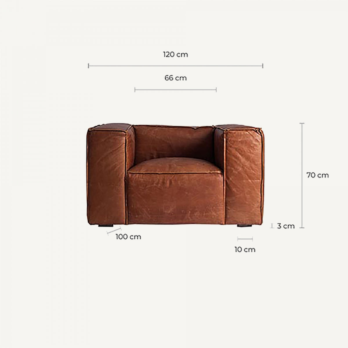 Sillón de cuero marrón con dimensiones, proporciones amplias y confortables, estilo industrial elegante
