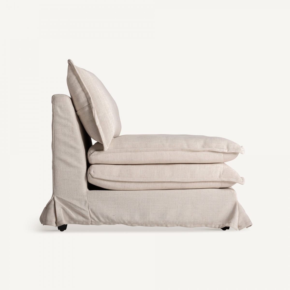 Vista lateral del sillón modular en lino beige, asiento acolchado de gran confort